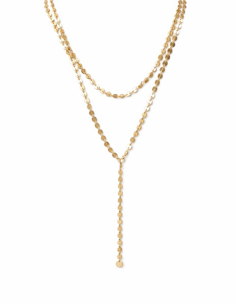 Double layer gold disc chain with lariat style on longer layer.  16" shorter layer with 18" longer layer. 