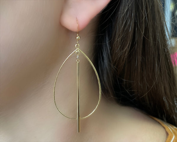 gold hoop earrings with bar